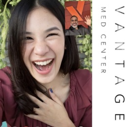 a girl laughing on a video call